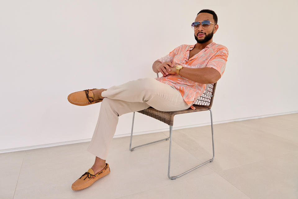 John Legend poses in Sperry styles exclusively for his Footwear News cover shoot, June 2021. - Credit: Yu Tsai