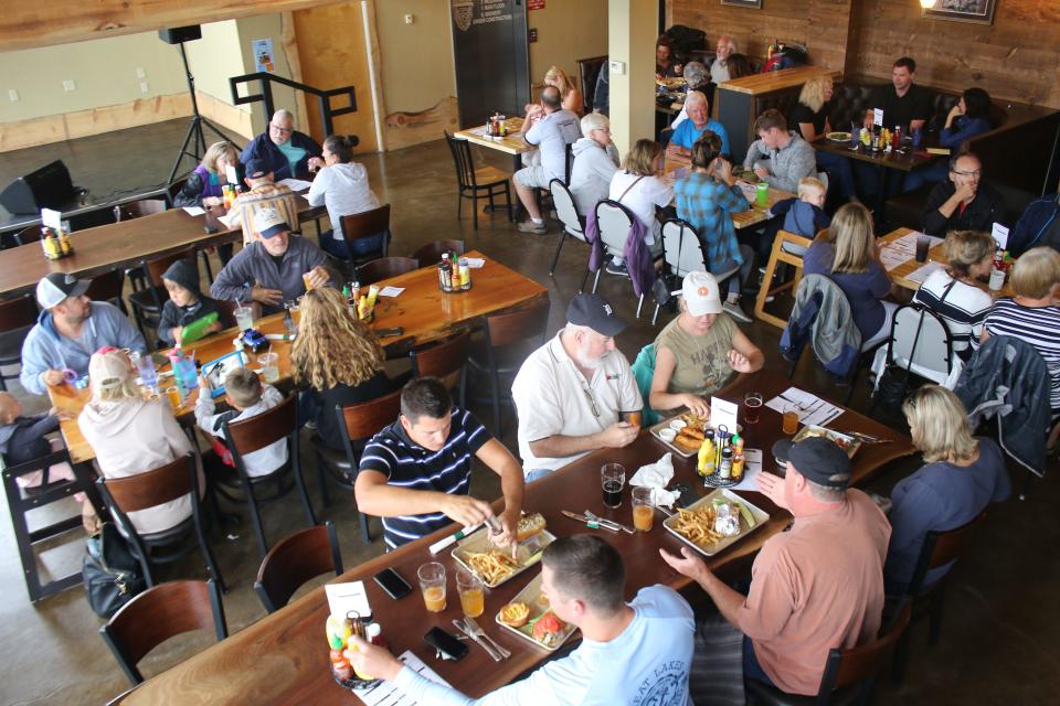 People enjoy eating lunch at Beards Brewery in Petoskey.