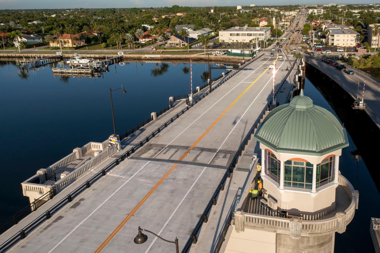 Cars drive over the new Southern Boulevard bridge that connects West Palm Beach and Palm Beach on Sept. 1.