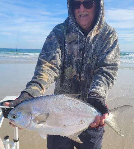 Here's Marco Pompano's buddy, "Bobby the Mailman," with a large pompano he brought to the shore this week.