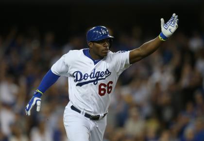 Yasiel Puig homered in the Dodgers' division-clinching victory. (Getty Images)