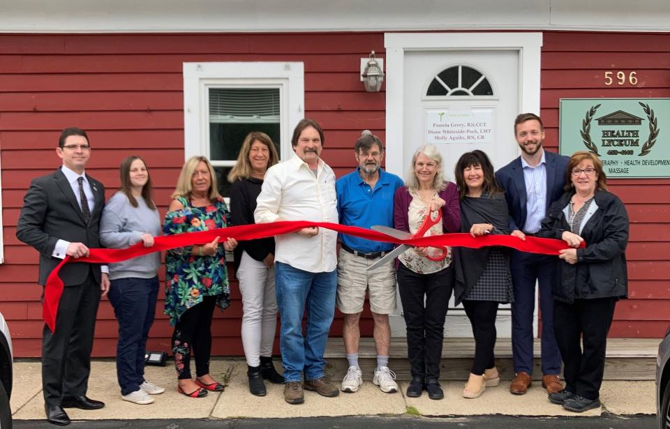 The Sanford Springvale Chamber Ambassador Committee held a ribbon cutting ceremony for Pedi Quest Reflexology. Attending the ribbon cutting from left to right are Sean Dumont Edward Jones Investments, Rebecca Lapierre Town Square Realty, Caren Martineau Batchelder Brothers Ins, Karen and Al Hebb Town Square Realty, Rick Stanley Chamber President, Holly Aguilo Owner Reflexologist of Pedi Quest Reflexology, Evelyn Libby Fresh Start Boutique, Alex Shain, Partners Bank, and Stephanie Wilkins, Altrusa International.