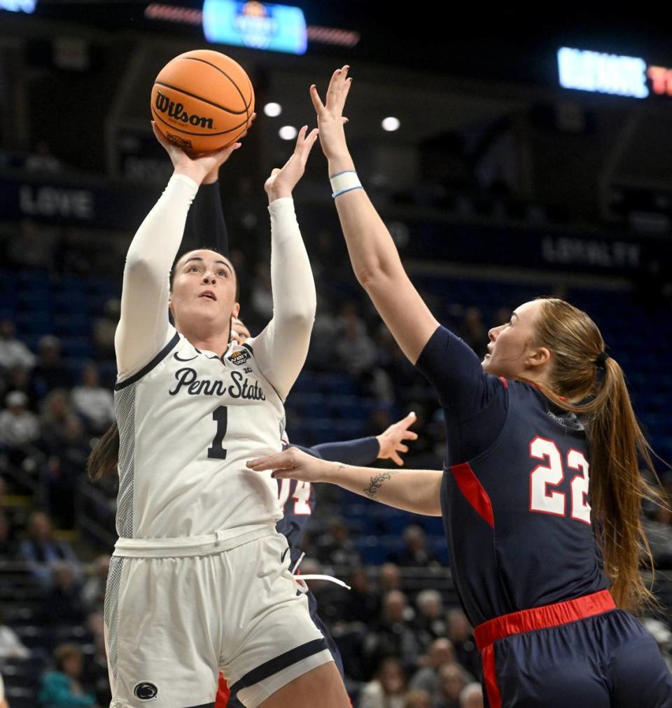 Penn State’s Ali Brigham shoots for a basket over Belmont defenders during the game on Monday, March 25, 2024 at the Bryce Jordan Center. Penn State won, 74-66, to move on in the WBIT.