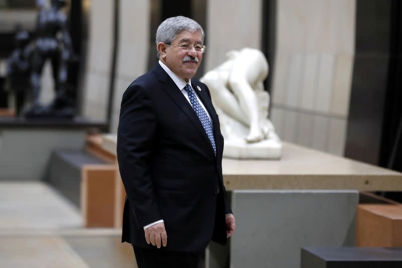 FILE PHOTO: Former Algerian Prime Minister Ahmed Ouyahia arrives at a dinner in Paris during events marking Armistice Day, 100 years after the end of World War One, in Paris, France