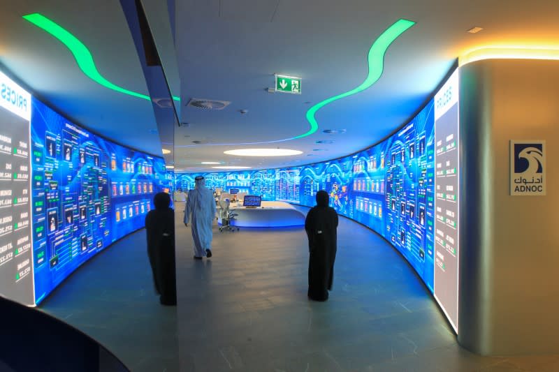 Employees are seen at the Panorama Digital Command Centre at the ADNOC headquarters in Abu Dhabi