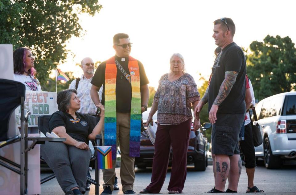 Community members from both sides of a proposed Rocklin Unified School District Board policy debate Wednesday outside of the meeting. The policy, which opponents say violates state law, was approved 4-1 by the board, requiring staff to notify families within days of a student’s choosing to be identified as any name, nickname, or gender that does not match enrollment records or is not a “common” nickname recognized by the school.