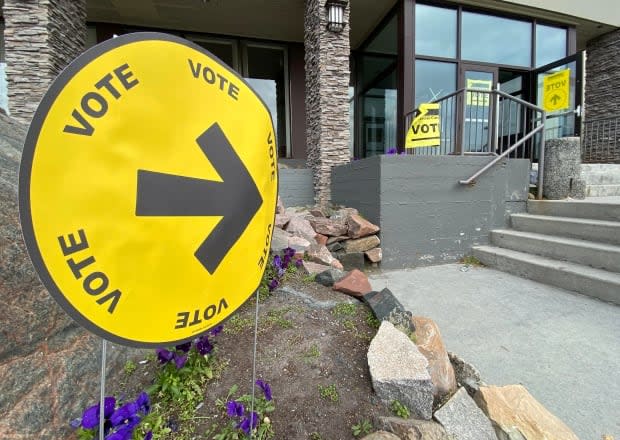 A COVID-19 public exposure notice was issued for the polling station at the Explorer Hotel in Yellowknife. Anyone who was there on Sept. 20 between noon and 1 p.m. should monitor for symptoms, and self-isolate and get tested if they develop. (Chantal Dubuc/CBC - image credit)