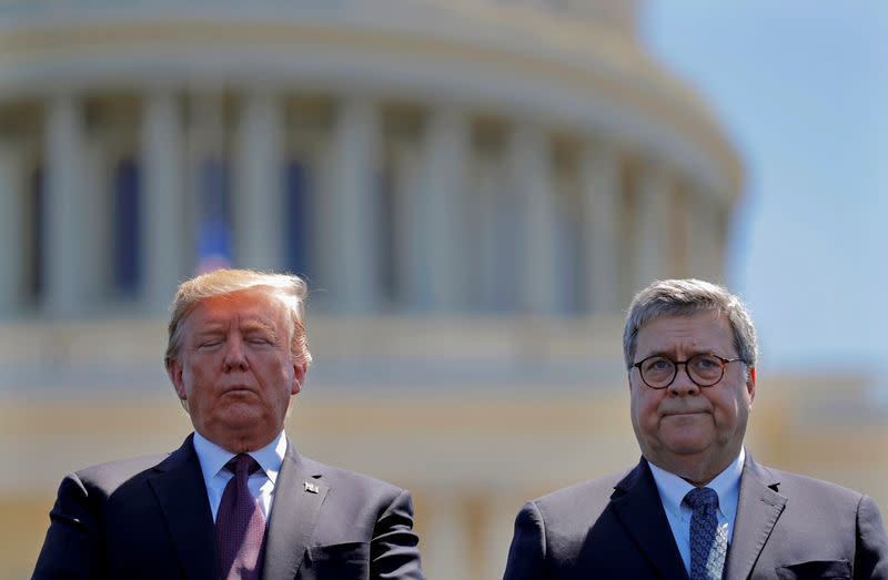 FILE PHOTO: U.S. President Donald Trump and U.S. Attorney General William Barr attend the 38th Annual National Peace Officers Memorial Service on Capitol Hill in Washington