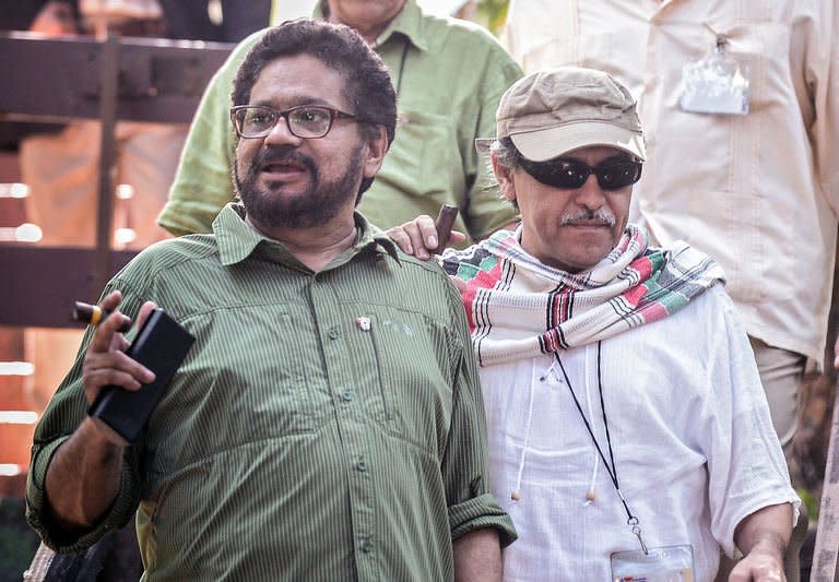 FARC Commanders Ivan Marquez (L) and Jesus Santrich (R), members of the FARC-EP peace talks delegation, arrive for a press conference, on February 10, 2013 in Havana