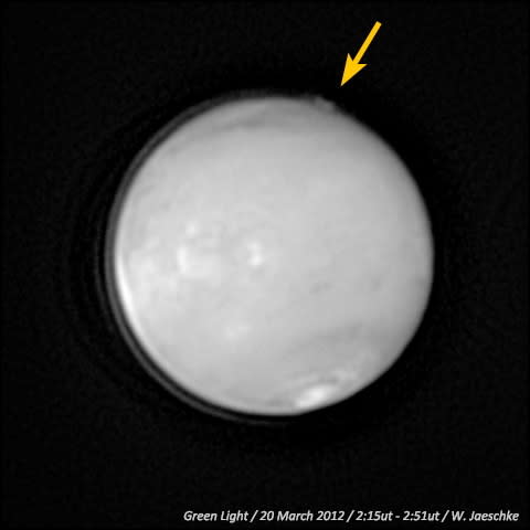 Caption: An image captured by amateur astronomer W. Jaeschke in 2012 revealed a mysterious plumelike feature (marked with yellow arrow) at the limb of the Red Planet. The image is shown with the North Pole toward the bottom and the South Pole t