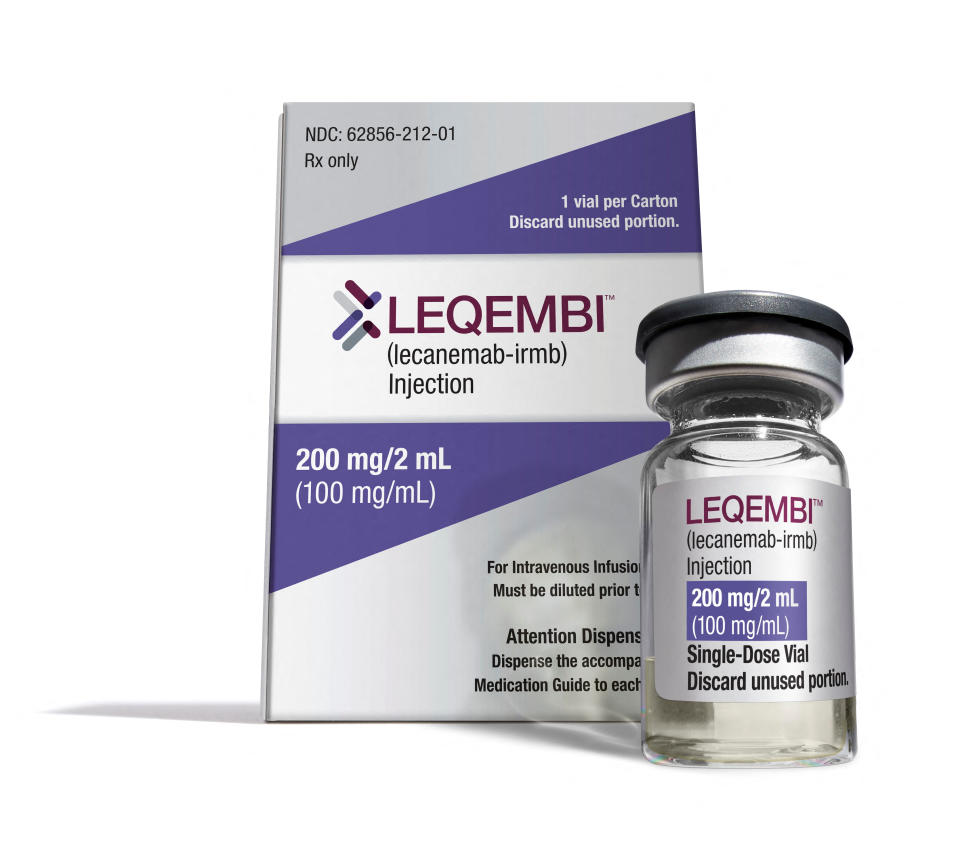 A bottle of the Alzheimer's drug LEQEMBI is shown next to its packaging.