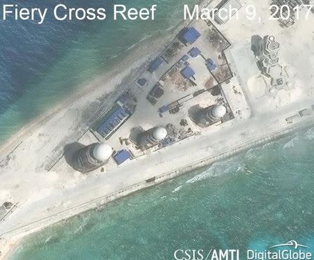 Construction is shown on Fiery Cross Reef, in the Spratly Islands, the disputed South China Sea in this March 9, 2017 satellite image released by CSIS Asia Maritime Transparency Initiative at the Center for Strategic and International Studies (CSIS) to Reuters on March 27, 2017. MANDATORY CREDIT: CSIS/AMTI DigitalGlobe/Handout via REUTERS