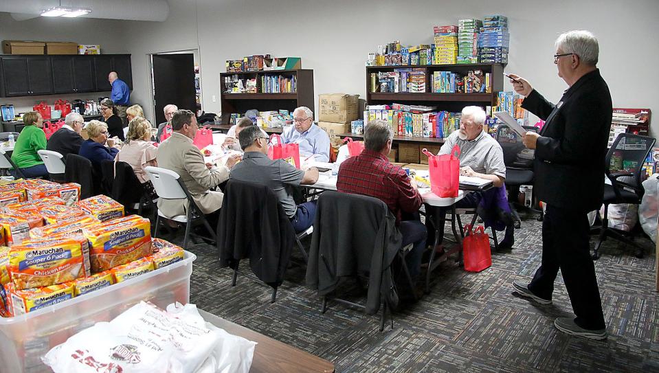 Ashland Rotary president Ted Daniels addresses the club at their meeting at Associated Charities on Tuesday, May 3, 2022. TOM E. PUSKAR/TIMES-GAZETTE.COM