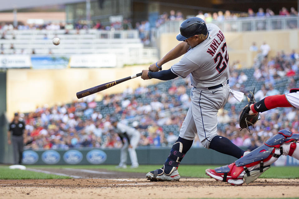 Cleveland Guardians' Josh Naylor hits a two-run homer against the Minnesota Twins in the second inning of a baseball game Tuesday, June 21, 2022, in Minneapolis. (AP Photo/Andy Clayton-King)