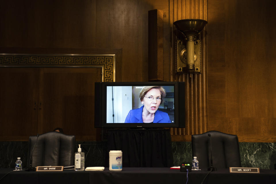 Sen. Elizabeth Warren, D-Mass., speaks via video link during a nomination hearing for Brian Miller, who is nominated to be Department of the Treasury Special Inspector General for Pandemic Recovery, and Dana Wade, nominated to be Assistant Secretary of Housing and Urban Development, during a hearing before the Senate Banking, Housing, and Urban Affairs Committee on Capitol Hill in Washington, Tuesday, May 5, 2020. (Salwan Georges/The Washington Post via AP, Pool)