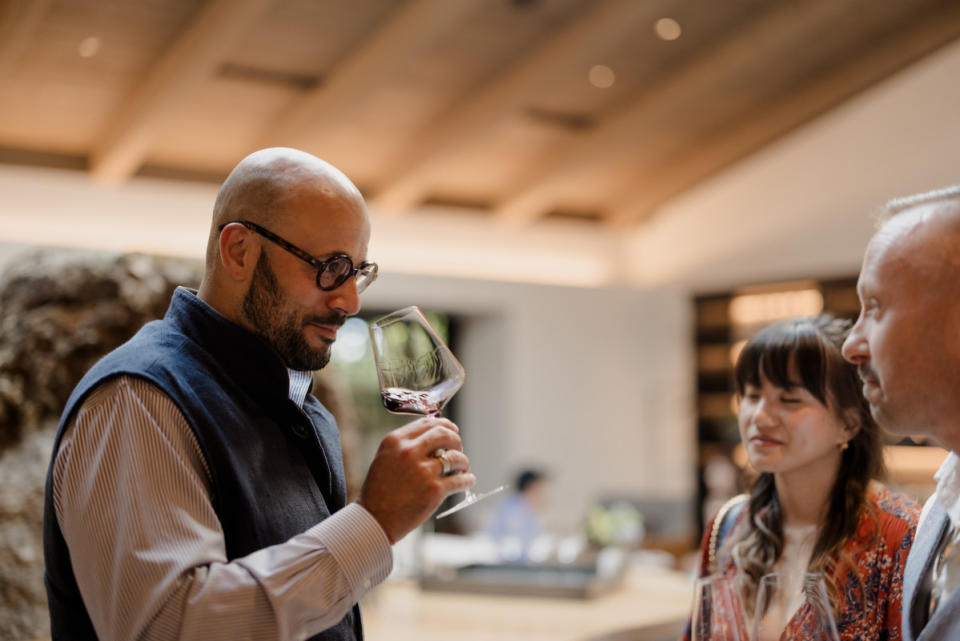 Carlton McCoy, Master Sommelier and Lawrence Wine Estates CEO, with tasting room guests.<p>Courtesy of Lawrence Wine Estates</p>