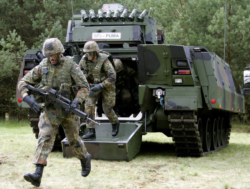 FILE PHOTO: Soldiers conduct an exercise with the new German Armoured Infantry Fighting Vehicle AIFV Puma for th..