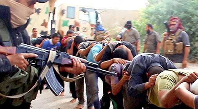 This image posted online by Islamic State militants on June 14, 2014 shows Iraqi cadets captured by IS moments before they were killed in Tikrit, Iraq. Photo: AP