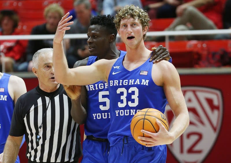 BYU forward Caleb Lohner (33) is upset after being fouled at the end of the game by Utah in Salt Lake City on Saturday, Nov. 27, 2021. BYU won 75-64. | Jeffrey D. Allred, Deseret News