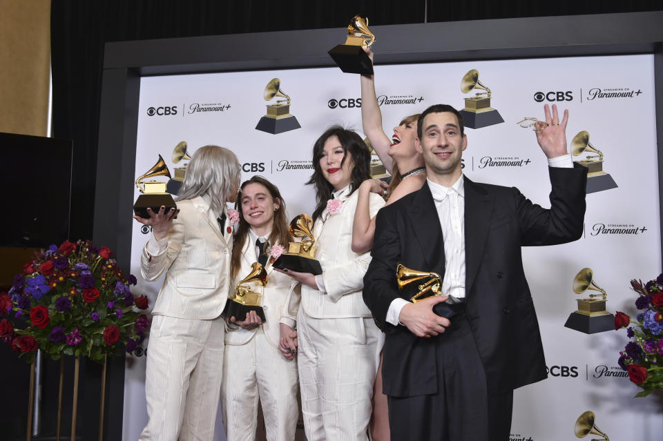 Phoebe Bridgers, from left, Julien Baker, and Lucy Dacus of boygenius pose in the press room with the awards for best rock performance and best rock song for "Not Strong Enough," and best alternative music album for "The Record." Taylor Swift, center right, and Jack Antonoff pose with the award for record of the year for "Midnights" during the 66th annual Grammy Awards on Sunday, Feb. 4, 2024, in Los Angeles. (Photo by Richard Shotwell/Invision/AP)