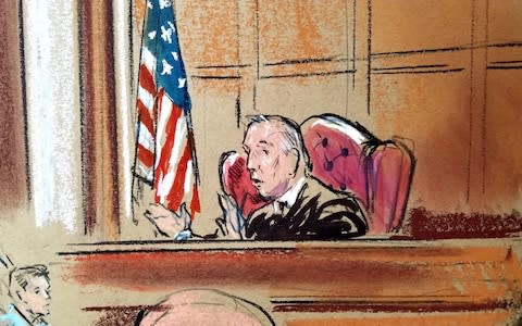 Judge TS Ellis - shown in a courtroom sketch - cut a controversial figure throughout the trial, clashing repeatedly with prosecutors - Credit: Bill Hennessy/Reuters