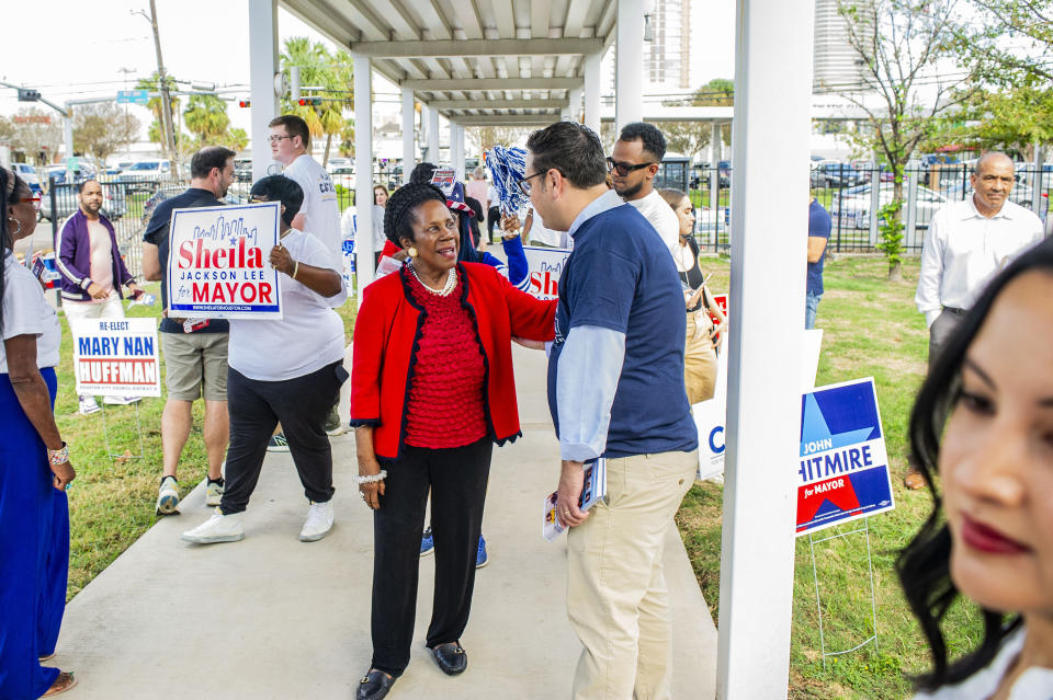 Mayoral candidate and U.S. Rep. Sheila Jackson Lee chats with voters outside the West Gray Metropolitan Multi-Service Center polling location Tuesday, Nov. 7, 2023, in Houston. (Kirk Sides/Houston Chronicle via AP)