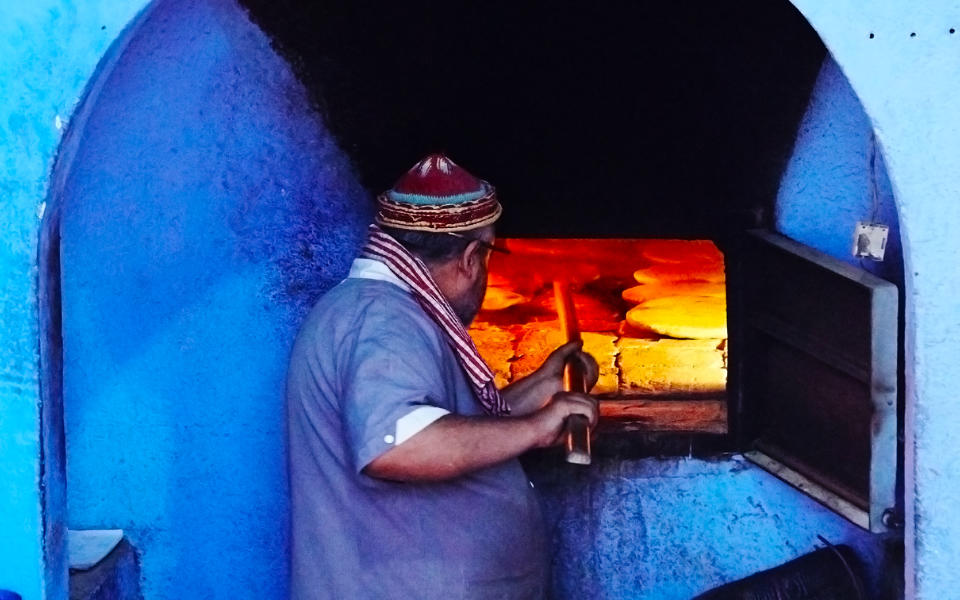<p>You can still find communal ovens in Morocco. Here, for a small fee, locals can have their dough baked into Khubz.</p>