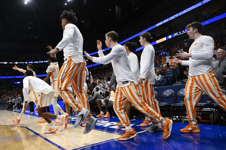 Tennessee players celebrate as the first half ends against Mississippi during an NCAA college basketball game in the second round of the Southeastern Conference Tournament, Thursday, March 9, 2023, in Nashville, Tenn. (AP Photo/John Amis)