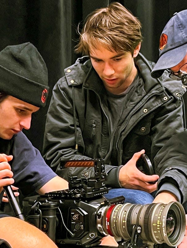 Student cinematographer Dean Fadley (left) and student director Liam Mullen (right) on the set of “The Neighborhood Milkman."