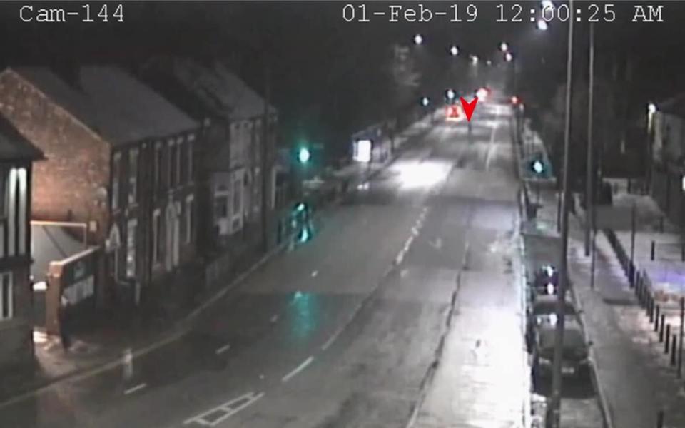 Pawel Relowicz (red arrow) is seen darting across the road to intercept Libby Squire - Humberside Police