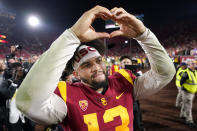 Southern California quarterback Caleb Williams gestures to fans after USC defeated Notre Dame 38-27 an NCAA college football game Saturday, Nov. 26, 2022, in Los Angeles. (AP Photo/Mark J. Terrill)