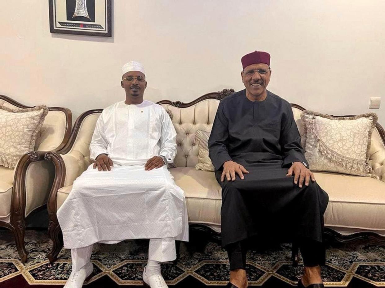 PHOTO: This image obtained from the Facebook page of the president of Chad, General Mahamat Idriss Deby Itno, shows him meeting with ousted Niger President Mohamed Bazoum in Niamey on July 30, 2023. (Facebook/AFP via Getty Images)