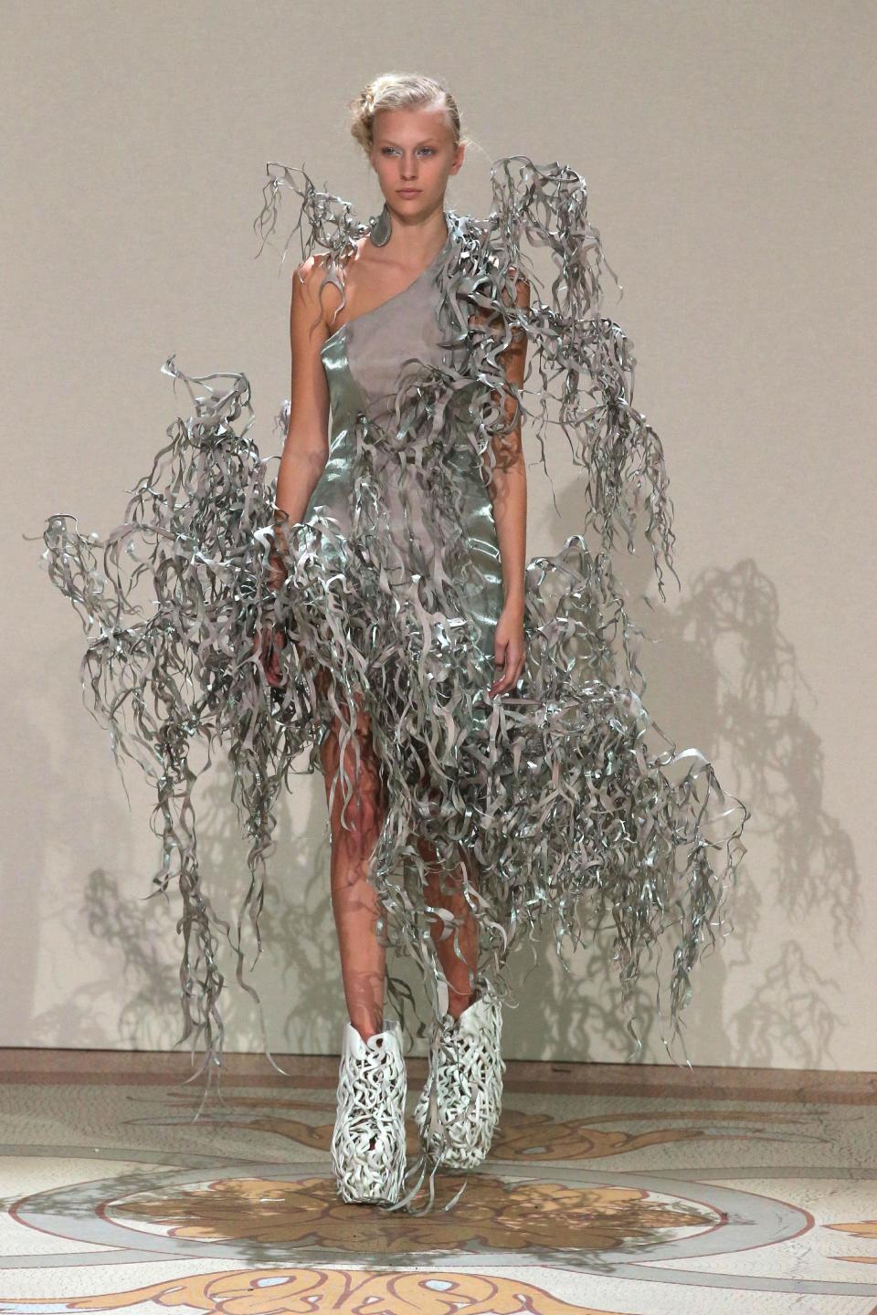 A model wears a creation of Dutch designer Iris van Herpen for the Haute Couture Fall-Winter 2013-2014 collection, Monday, July 1, 2013 in Paris. (AP Photo/Michel Euler)