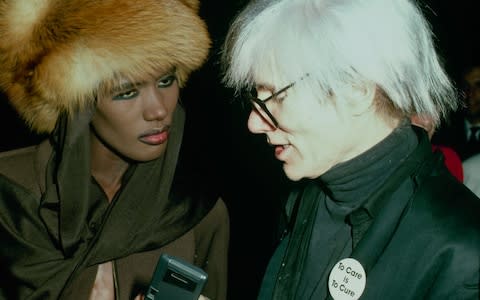 Grace Jones with Andy Warhol, around 1980 - Credit: Getty 