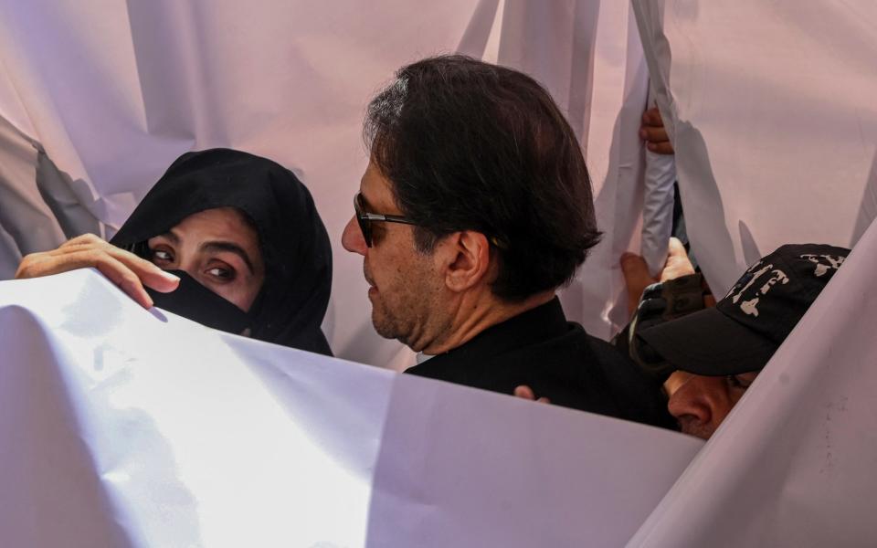 Imran Khan with his wife Bushra Bibi