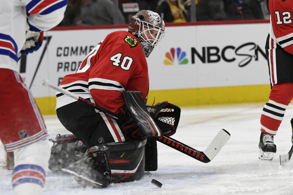 Chicago Blackhawks goalie Robin Lehner (40) of Sweden, makes a save during the second period of an NHL hockey game against the New York Rangers Wednesday, Feb. 19, 2020, in Chicago. (AP Photo/Paul Beaty)
