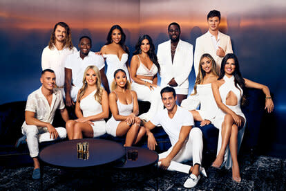 Southern Hospitality Season 2 Cast all dressed in white sitting down on a couch.