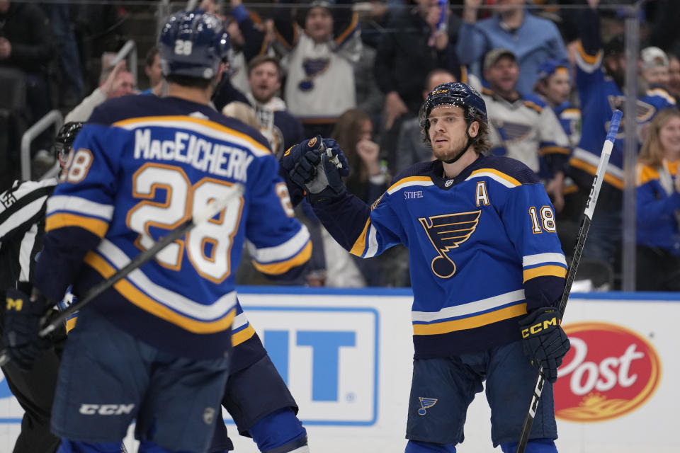St. Louis Blues' Robert Thomas celebrates after scoring during the second period of an NHL hockey game against the Ottawa Senators Thursday, Dec. 14, 2023, in St. Louis. (AP Photo/Jeff Roberson)