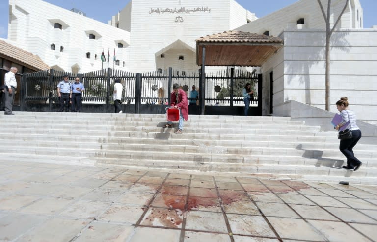 Jordanian writer Nahed Hattar was struck by three bullets before the alleged assassin was arrested at the scene of the shooting in Amman's central Abdali district