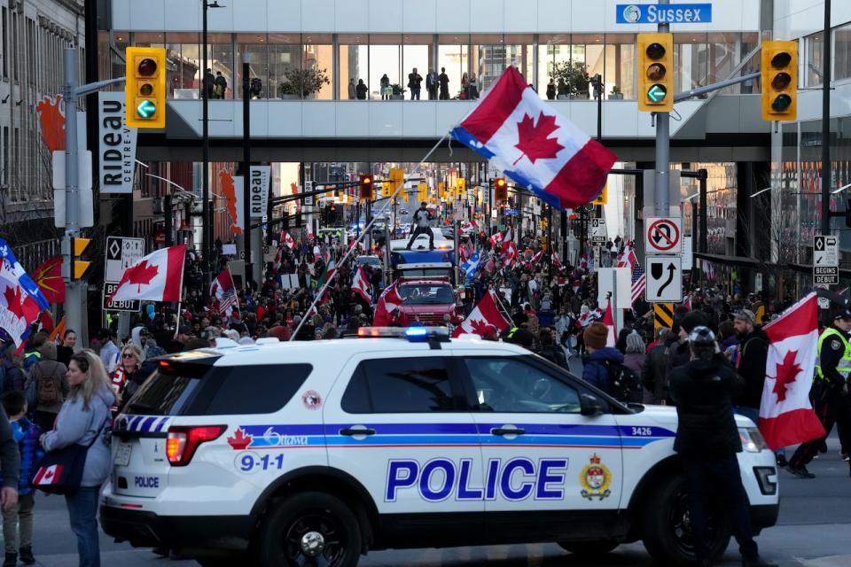 Ottawa police block Rideau Street with a cruiser as protesters gather during the Rolling Thunder rally in Ottawa April 29, 2022.