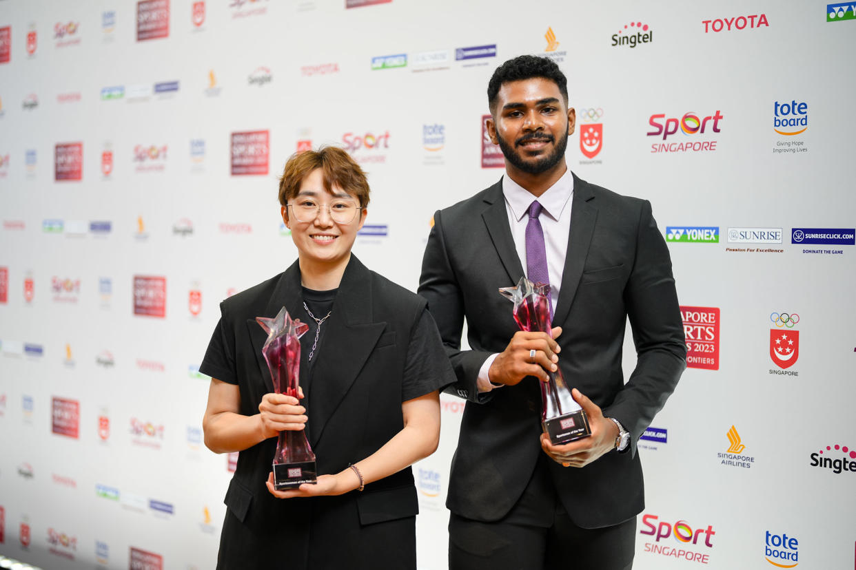 Paddler Feng Tianwei (left) with her Sportswoman of the Year trophy and silat exponent Sheik Farhan Sheik Alau'ddin with his Sportsman of the Year trophy at the 2023 Singapore Sports Awards. (PHOTO: Kong Chong Yew/SNOC)