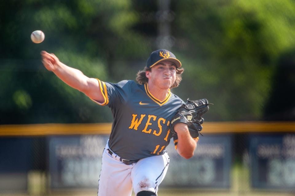 Central Bucks West senior Julio Ermigiotti makes his pitch during the District One semifinal victory over North Penn.