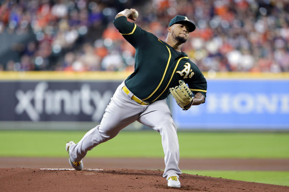 Oakland Athletics starting pitcher Frankie Montas throws against the Houston Astros during the first inning of a baseball game Thursday, July 8, 2021, in Houston. (AP Photo/Michael Wyke)