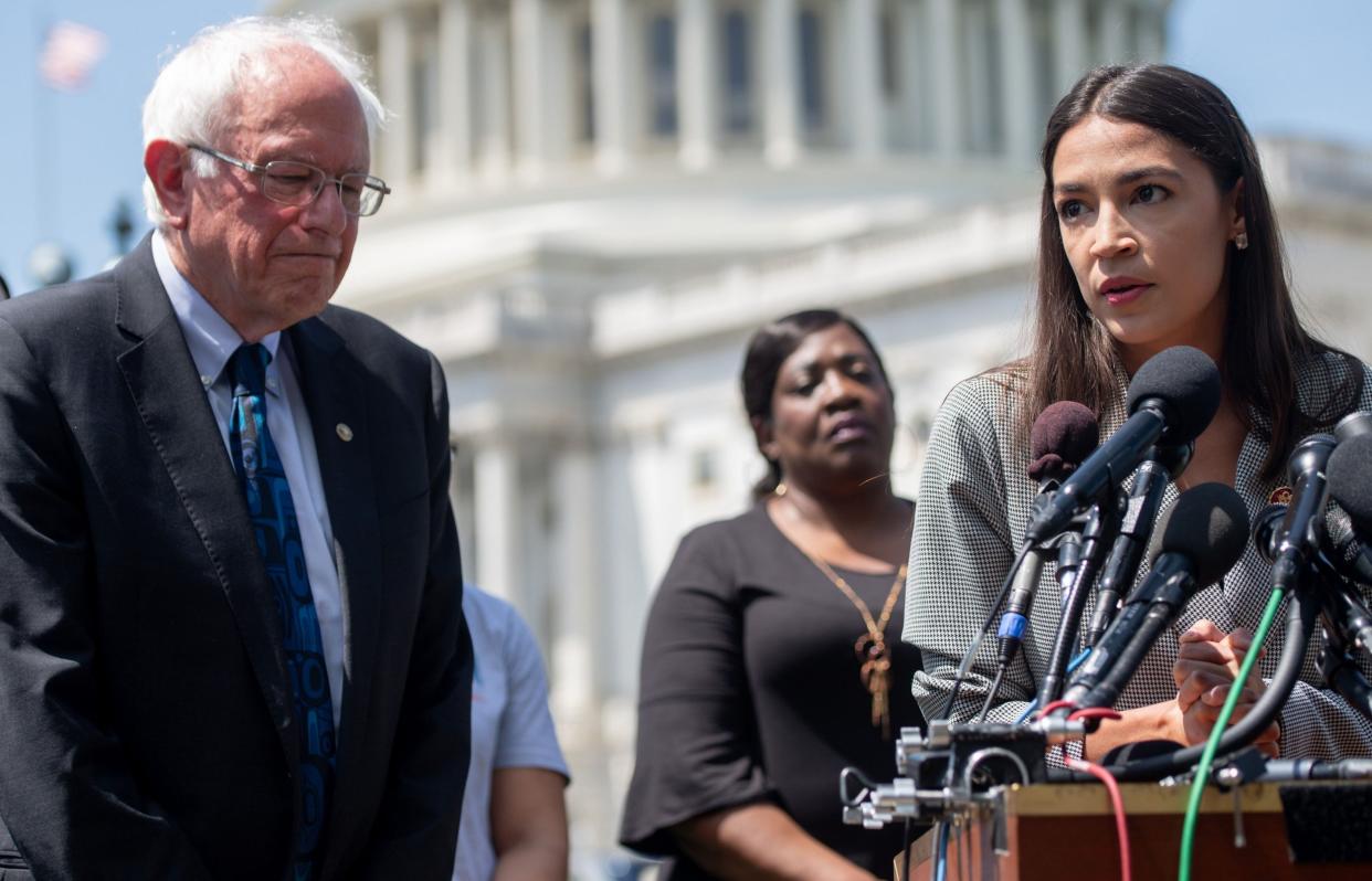 Bernie Sanders with Alexandria Ocasio-Cortez outside the US Capitol in Washington DC: AFP via Getty Images