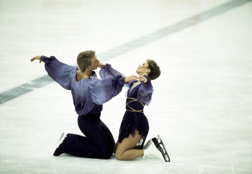 1984:  Jayne Torvill and Christopher Dean of Great Britain on their way to winning gold medals in the Ice Dancing event during the Sarajevo Winter Olympic Games in Yugoslavia. \ Mandatory Credit: AllsportUK  /Allsport