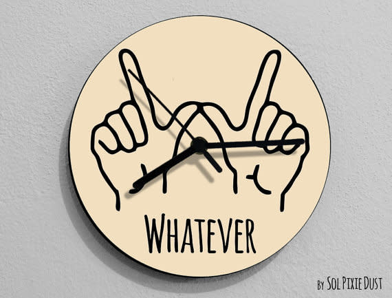 <i>Whatever Hand Symbol Wall Clock, <a href="https://www.etsy.com/listing/229276693/whatever-hand-symbol-round-beige-wall?ga_order=most_relevant&amp;ga_search_type=all&amp;ga_view_type=gallery&amp;ga_search_query=funny%20wall%20clock&amp;ref=sr_gallery_38" target="_blank">$14.90</a></i>