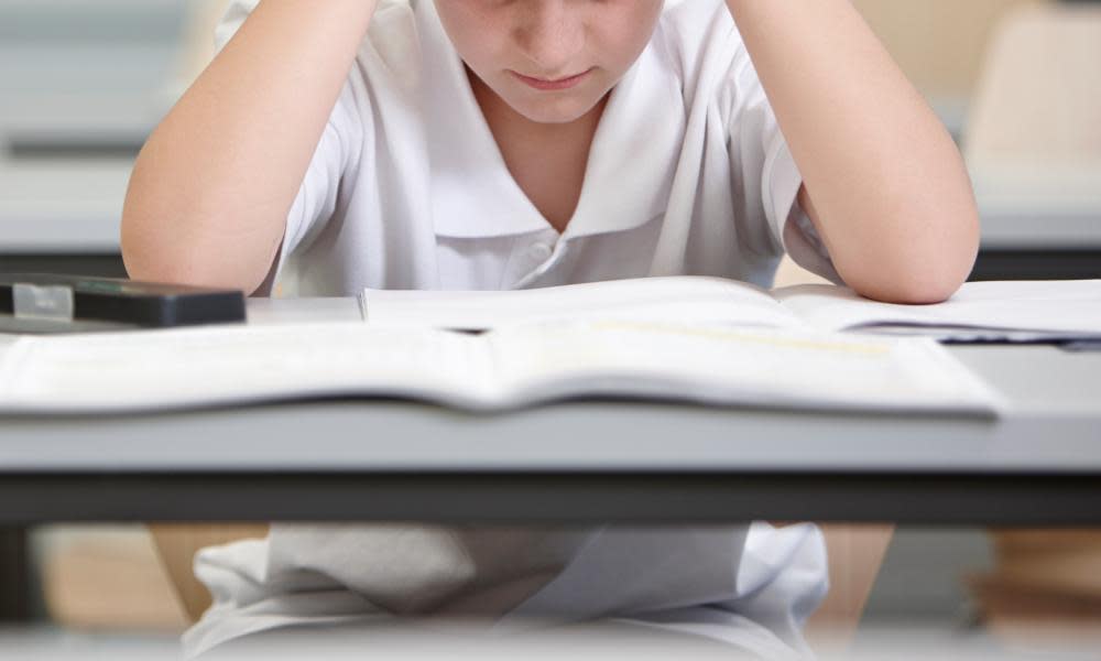 Boy at a school desk