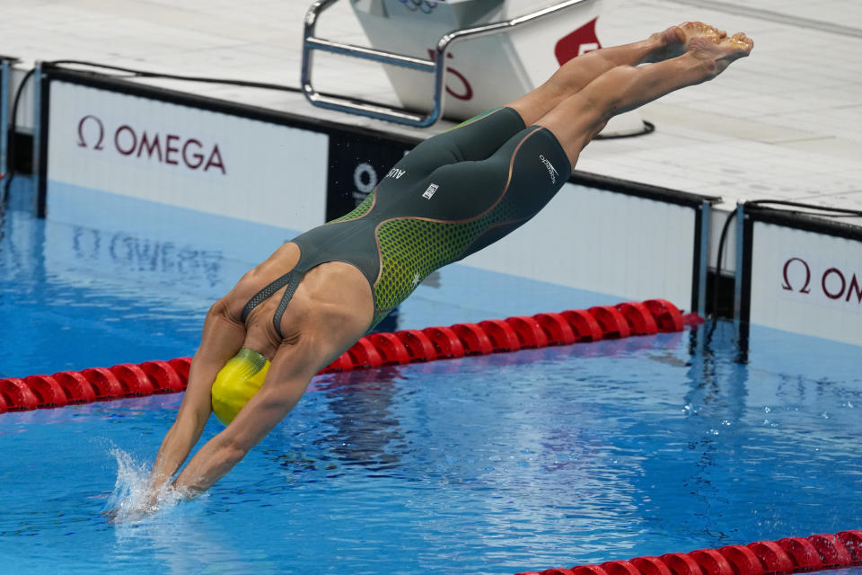 Emma Mckeon, of Australia, dives off the starting block in the women's 50-meter freestyle final at the 2020 Summer Olympics, Sunday, Aug. 1, 2021, in Tokyo, Japan. (AP Photo/Jae C. Hong)