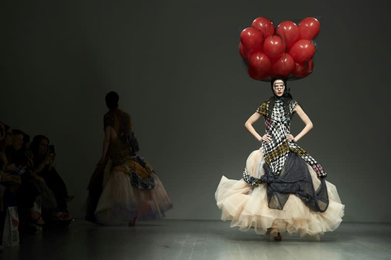 Matty Bovan's balloon headdresses came in red, gold, silver and tiger skin