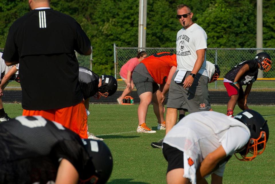 North Davidson coach Brian Flynn, shown here in 2019, will miss the first four games of the 2022 season.